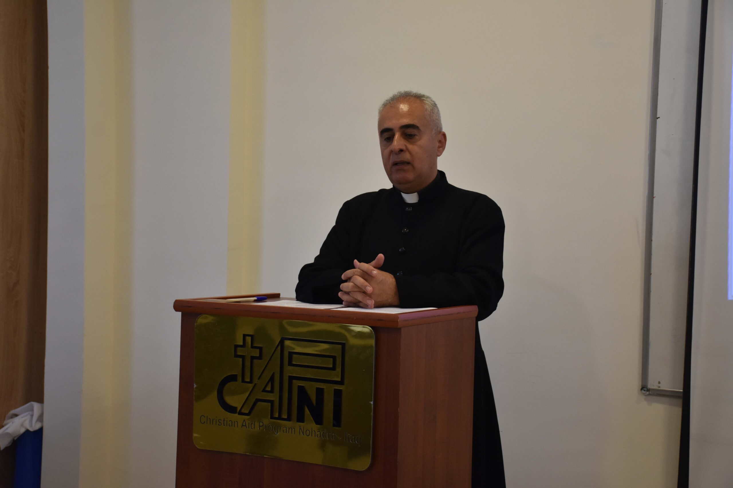 Father Behnam Lalo Leads Prayer for Al-Haitham Hall Tragedy Victims at CAPNI Headquarters